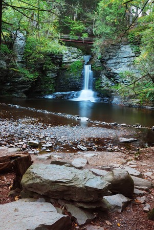 Waterfall with trees and rocks in mountain in Autumn. From Pennsylvania Dingmans Falls.の写真素材