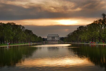 Lincoln Memorial at sunset with lake reflections, Washington DCの写真素材