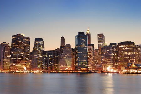 New York City Manhattan skyline at dusk over Hudson River with skyscrapersの写真素材