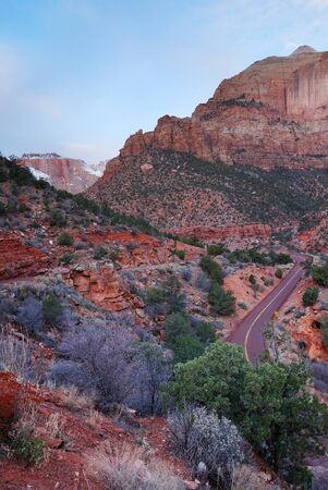 Zion National Park in the morning with red rocks, road and snow in winter, Utah. の写真素材