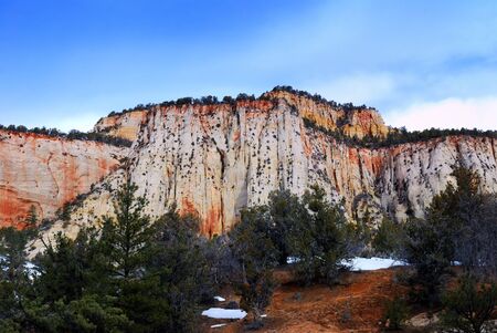 Zion National Park with landmark in the morning with red rocks, road and snow in winter, Utah.の写真素材