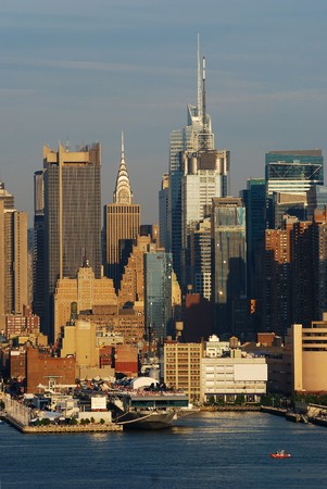 New York City Manhattan skyline at sunset with skyscrapers over Hudson river.の写真素材
