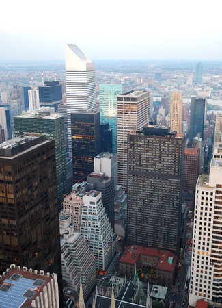 Urban city aerial view. New York City Manhattan sunset panorama aerial view with skyline and skyscrapersの写真素材