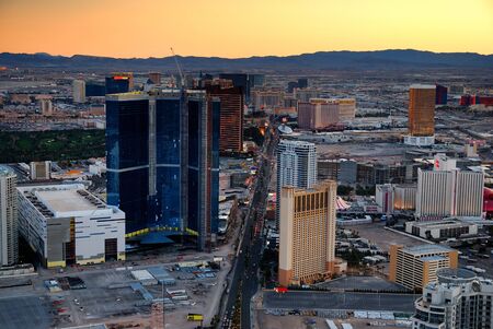Las Vegas aerial view at sunset with mountain and luxury hotels.の写真素材