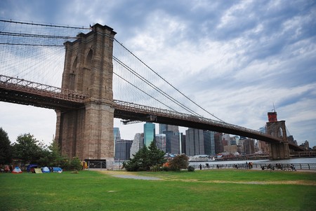 New York City Brooklyn bridge and Manhattan skyline at dusk.の写真素材