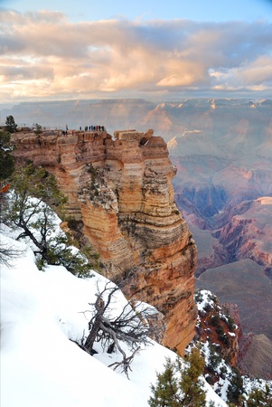 Grand Canyon panorama view in winter with snow and clear blue sky.の写真素材