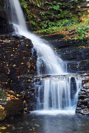 Autumn Waterfall in mountain from Bushkill Falls, Pennsylvania.の写真素材