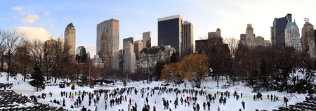 NEW YORK CITY, NY - JAN 1: People skate on ice with white Christmas in Central Park welcome the new year of 2010 on January 1, 2011 in Manhattan, New York City.のeditorial素材