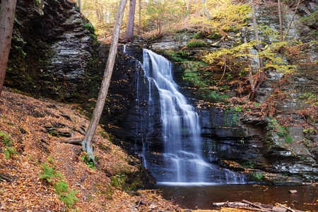 Autumn Waterfall in mountain with foliage. Bridesmaid Falls from Bushkill Falls, Pennsylvania.の写真素材