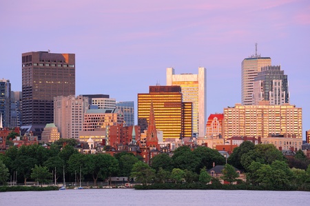 Boston sunset over Charles River with urban skyscrapers.の写真素材