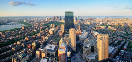 Urban city aerial panorama view. Boston aerial view with skyscrapers at sunset with city downtown skyline.の写真素材