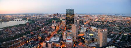 Urban city aerial panorama view. Boston aerial view with skyscrapers at sunset with city downtown skyline.の写真素材