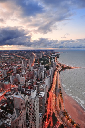 Chicago skyline panorama aerial view with skyscrapers over Lake Michigan with cloudy  sky at sunset.のeditorial素材