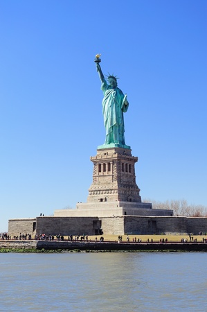Statue of Liberty on Liberty Island closeup with blue sky in New York City Manhattanのeditorial素材