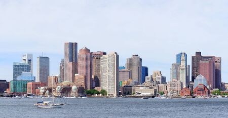 Boston downtown skyline in the morning with urban skyscrapers over sea.のeditorial素材