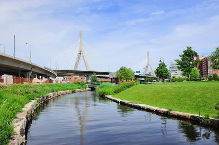 Boston Leonard P. Zakim Bunker Hill Memorial Bridge with blue sky as the famous land mark over Charles River.の写真素材