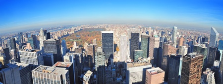 New York City skyscrapers in midtown Manhattan aerial panorama view in the day with Central Park and colorful foliage in Autumn.の写真素材