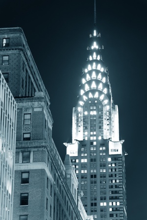 NEW YORK CITY, NY, USA - DEC 30: Chrysler Building at night with street on December 30, 2011, New York City. It was designed by architect William Van Alena as Art Deco architecture in US.のeditorial素材