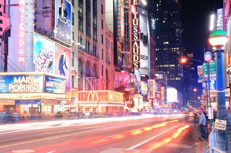 NEW YORK CITY, NY - DEC 12: 42nd Street with traffic and commercials on December  12, 2011 in New York City. 42nd Street is a major crosstown street known for its theaters and landmark architectures.のeditorial素材