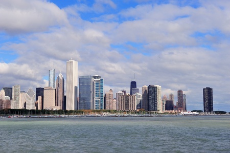 Chicago skyline panorama with skyscrapers over Lake Michigan with cloudy blue sky.のeditorial素材