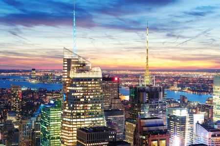 New York City skyline aerial view at dusk with skyscrapers of midtown Manhattan.のeditorial素材