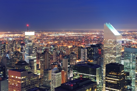 New York City skyline aerial view at dusk with skyscrapers of midtown Manhattan.の写真素材