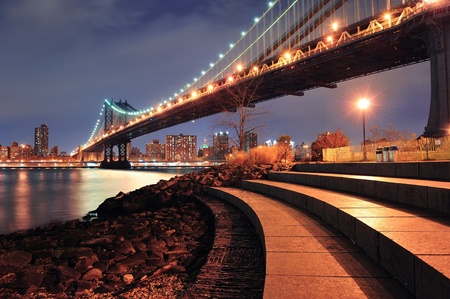 New York City Manhattan Bridge closeup with downtown skyline over East River.のeditorial素材