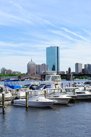 Boston Charles River with urban city skyline Hancock building and boat.のeditorial素材