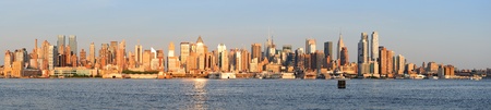 New York City Manhattan midtown skyline panorama at sunset.の写真素材