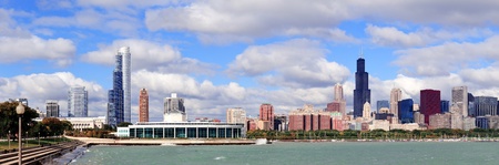 Chicago skyline panorama with skyscrapers over Lake Michigan with cloudy blue sky.の写真素材