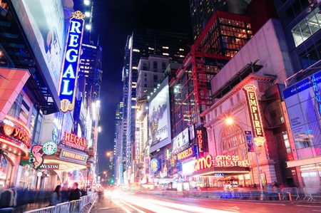 NEW YORK CITY, NY - DEC 12: 42nd Street with traffic and commercials on December  12, 2011 in New York City. 42nd Street is a major crosstown street known for its theaters and landmark architectures.のeditorial素材