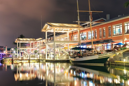 MIAMI, FL - FEB 8: Bayside Marketplace at night on February 8, 2012 in Miami, Florida. It is a festival marketplace and the top entertainment complex in Downtown Miami attracting 15M people annually.のeditorial素材