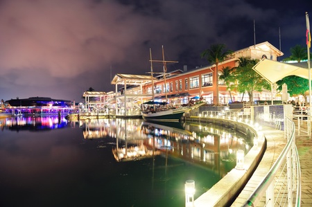 MIAMI, FL - FEB 8: Bayside Marketplace at night on February 8, 2012 in Miami, Florida. It is a festival marketplace and the top entertainment complex in Downtown Miami attracting 15M people annually.のeditorial素材