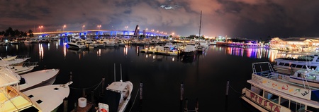 MIAMI, FL - FEB 8: Bayside Marketplace at night on February 8, 2012 in Miami, Florida. It is a festival marketplace and the top entertainment complex in Downtown Miami attracting 15M people annually.のeditorial素材
