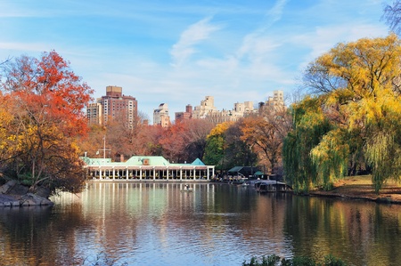 New York City Central Park in Autumn with lake and foliage.の写真素材