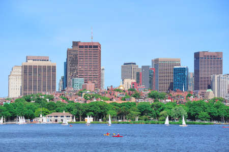 Boston skyline over Charles River with sailing boat.の写真素材