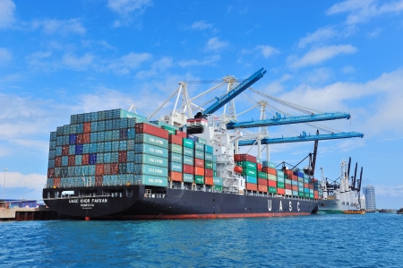 MIAMI, FL - FEB 10: Port of Miami with blue clear sky on February 10, 2012 in Miami, Florida. It is the 11th largest cargo port in the US. 1/7 the world¡¯s cruise passengers start from Miami.のeditorial素材