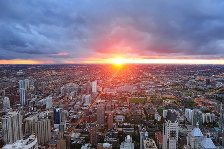 Chicago skyline panorama aerial view with skyscrapers and cloudy sky at sunset.のeditorial素材