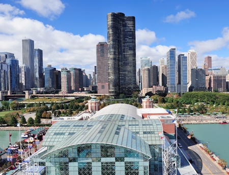 Chicago city downtown urban skyline with skyscrapers over Lake Michigan with cloudy blue sky.のeditorial素材