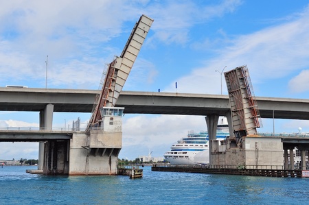 Bridge lifted preparing for boat to pass in Miami Harborのeditorial素材