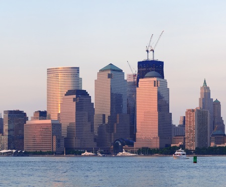 New York City Manhattan downtown skyline at sunset over Hudson River panoramaのeditorial素材