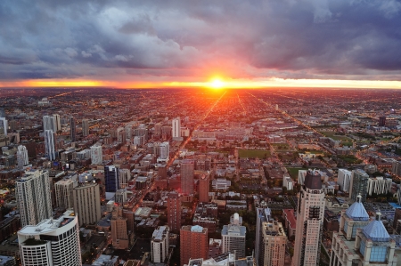 Chicago skyline panorama aerial view with skyscrapers and cloudy sky at sunset.の写真素材