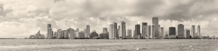 Miami skyline panorama in black and white in the day with urban skyscrapers and cloudy sky over sea の写真素材