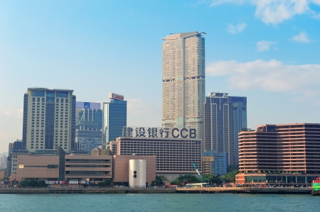 HONG KONG, CHINA - APR 22: Crowded skyscrapers over sea on April 23, 2012 in Hong Kong, China. With 7M population and land mass of 1104 sq km, it is one of the most dense areas in the world.のeditorial素材