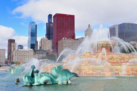 Chicago skyline panorama with skyscrapers and Buckingham fountain in Grant Park in the morning with cloud and blue sky.のeditorial素材