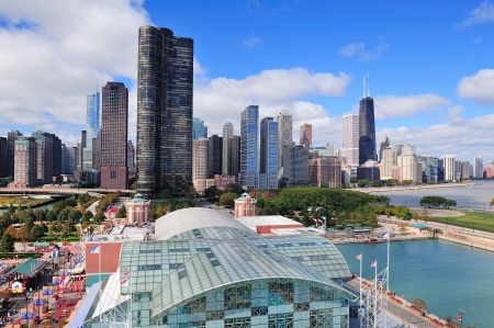 Chicago city downtown urban skyline with skyscrapers over Lake Michigan with cloudy blue sky.のeditorial素材