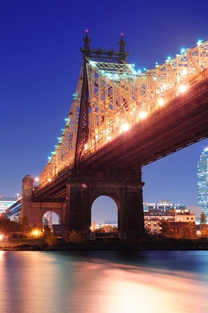 Queensboro Bridge over New York City East River at dusk viewed from midtown Manhattan.のeditorial素材