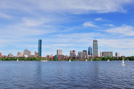 Boston Charles River with urban city skyline skyscrapers and boats with blue skyr.のeditorial素材
