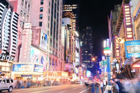NEW YORK CITY, NY - DEC 12: 42nd Street with traffic and commercials on December  12, 2011 in New York City. 42nd Street is a major crosstown street known for its theaters and landmark architectures.のeditorial素材