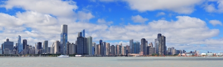 Chicago city urban skyline panorama with skyscrapers over Lake Michigan with cloudy blue sky のeditorial素材